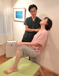 Checking neck and body movement while discussing self-care